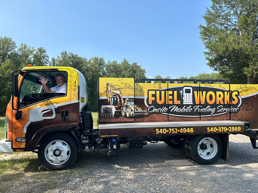 Photo of Fuel Works owner sitting in mobile fuel truck