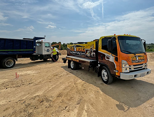 Photo of Fuel Works truck delivering on-road diesel fuel onsite to a truck